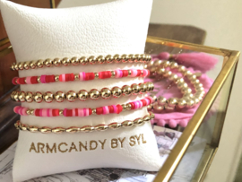 Armband Celine met real gold plated balletjes en roze en rode schijfjes
