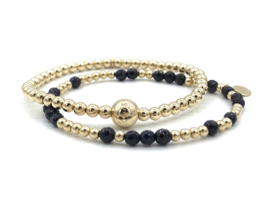 Armband Nine met real gold plated balletjes en donkerblauw goudsteen