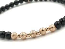 Armband Elize met rosé real gold plated balletjes en onyx edelsteen