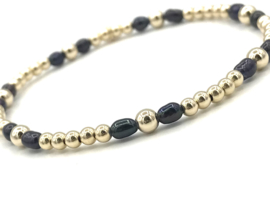 Armband Malou met real gold plated balletjes en zwarte ovale pareltjes