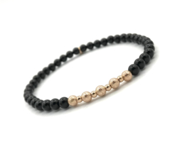 Armband Elize met rosé real gold plated balletjes en onyx edelsteen