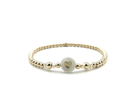 Armband Aniek met real gold plated balletjes en hartje van wit parelmoer