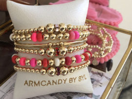 Armband Alisha pink/red  met gekleurde wieltjes en real gold plated balletjes