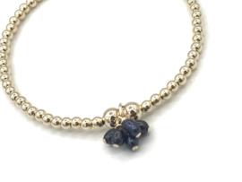 Armband Lindy met real gold plated balletjes en trosje van 5 zwarte ovale pareltjes