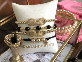 Stretch ring Elisabeth met real gold plated bolletjes en zwarte onyx disc