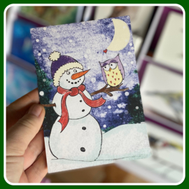Sneeuwpop met uil