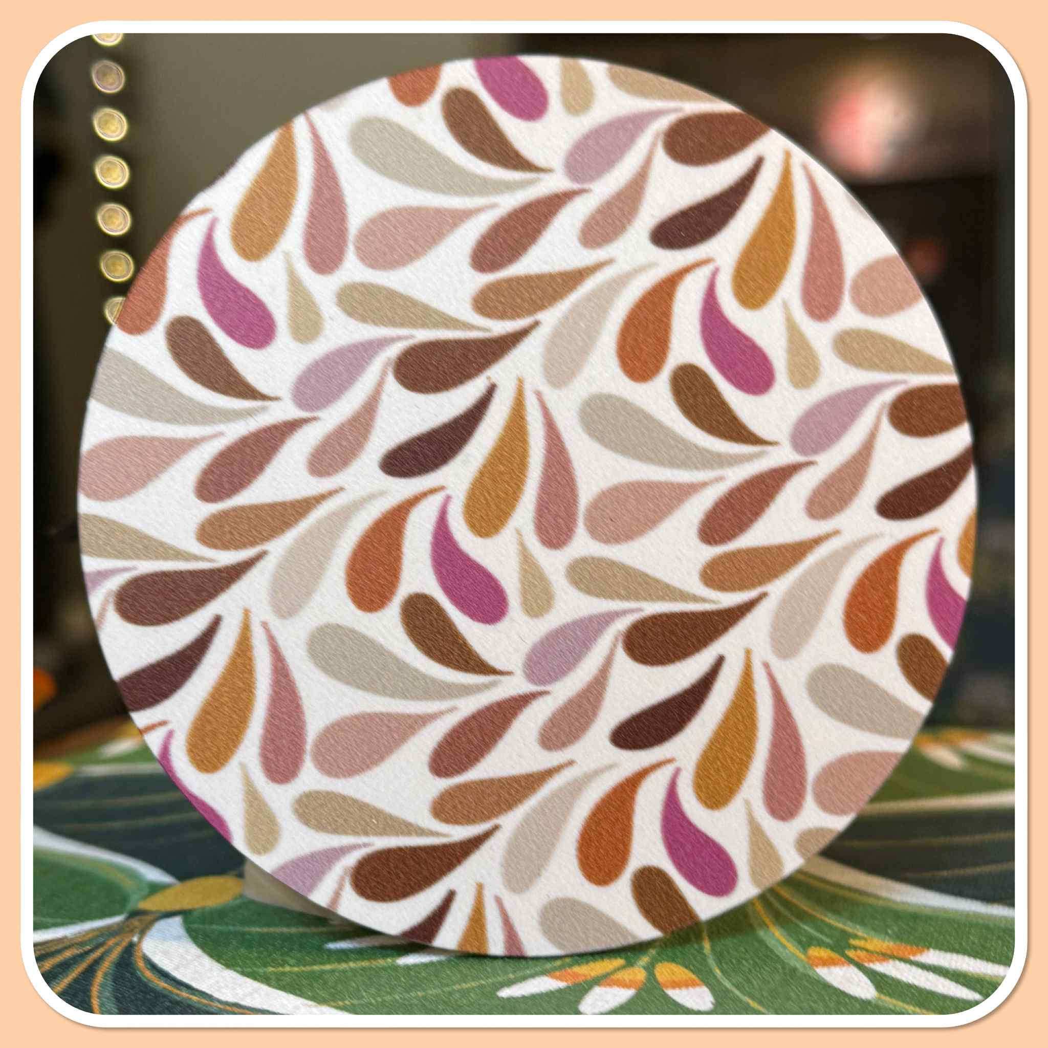 Ronde onderzetter druppels beige roze