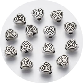 Metalen hartjes kralen 6x6x3 mm – 100 stuks