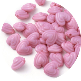 Kunststof hartjes kralen roze 11x11x7 mm – 25 stuks