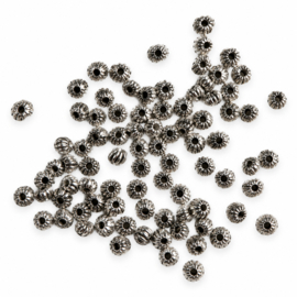 Kunststof spacer kralen zilverkleurig – 5×2,5mm – 50 stuks