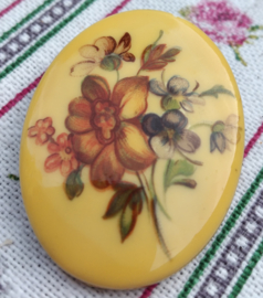 Broche vintage kunstof 4 cm