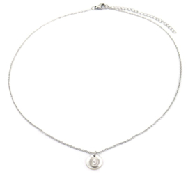 Zilveren ketting met een schelp charm