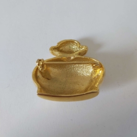 Goudkleurige broche (goud | flesje 2)