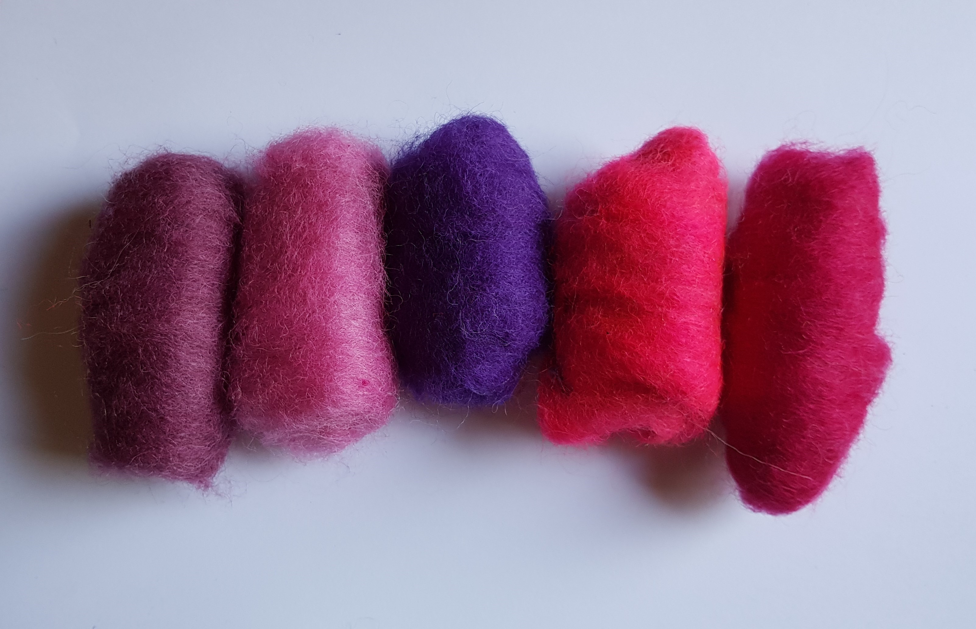 Gekaarde wol assorti  paars en roze tinten (639)