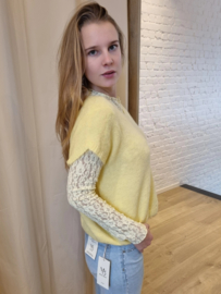 ruimer truitje zonder mouwen lichtgeel