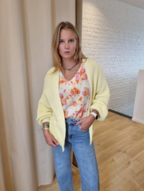 ruime cardigan in gebreid motief lichtgeel