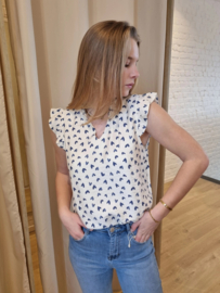 bloesje met volantmouwtjes en frulletjes met hartjesmotief blauw