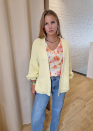 ruime cardigan in gebreid motief lichtgeel