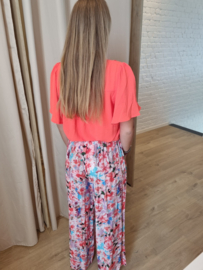 lossere broek met koraal en roze print