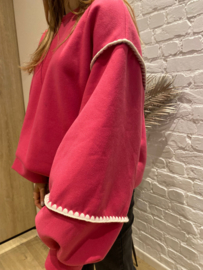 oversized sweater met versiering fuchsia