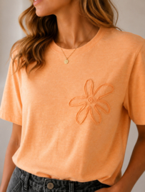 T-shirt oversize bloem oranje