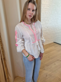 blouse met fluoroze accent en striklintje