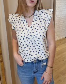 bloesje met volantmouwtjes en frulletjes met hartjesmotief blauw