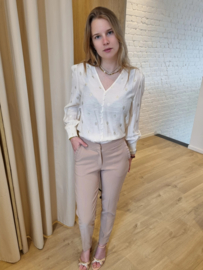 geklede broek met frulletjes aan de zakken beige