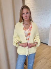 ruime cardigan in gebreid motief lichtgeel