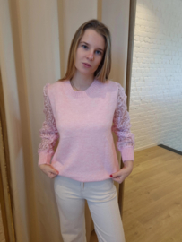 trui met knoopjes en versierde mouwen lichtroze