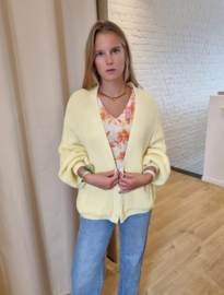 ruime cardigan in gebreid motief lichtgeel