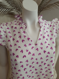 bloesje met volantmouwtjes en frulletjes met hartjesmotief