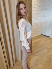 geklede broek met frulletjes aan de zakken beige