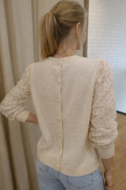 trui met knoopjes en versierde mouwen beige