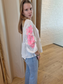 blouse met fluoroze accent en striklintje