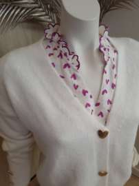 bloesje met volantmouwtjes en frulletjes met hartjesmotief