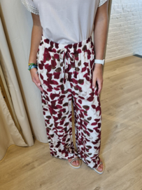 lossere broek met aubergine print