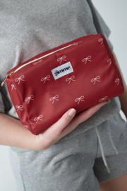 Toilettas rood met strikjes