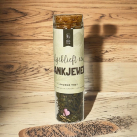 Glazen buisje met thee 'Alsjeblieft een dankjewel'