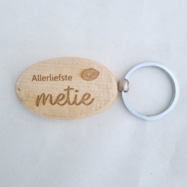 Houten sleutelhanger 'Allerliefste metie'