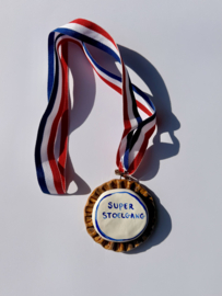 Medaille: Super stoelgang