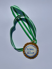 Medaille: Authentiek accent