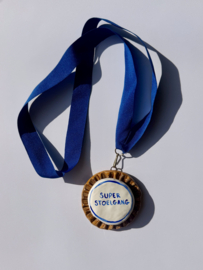 Medaille: Super stoelgang