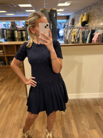 Donkerblauw fijn gebreid met schulprandje en gouden bolletjes