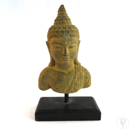 Stenen Boeddha hoofd op standaard