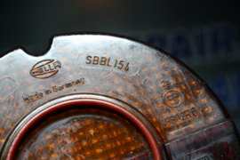 Achterlichtglas, merk Hella van een Opel Manta A, gebruikt.