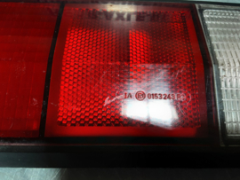 Achterlicht links Opel Manta B met zwarte rand, merk Hella.