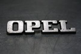 Embleem "Opel". Kofferbak embleem.