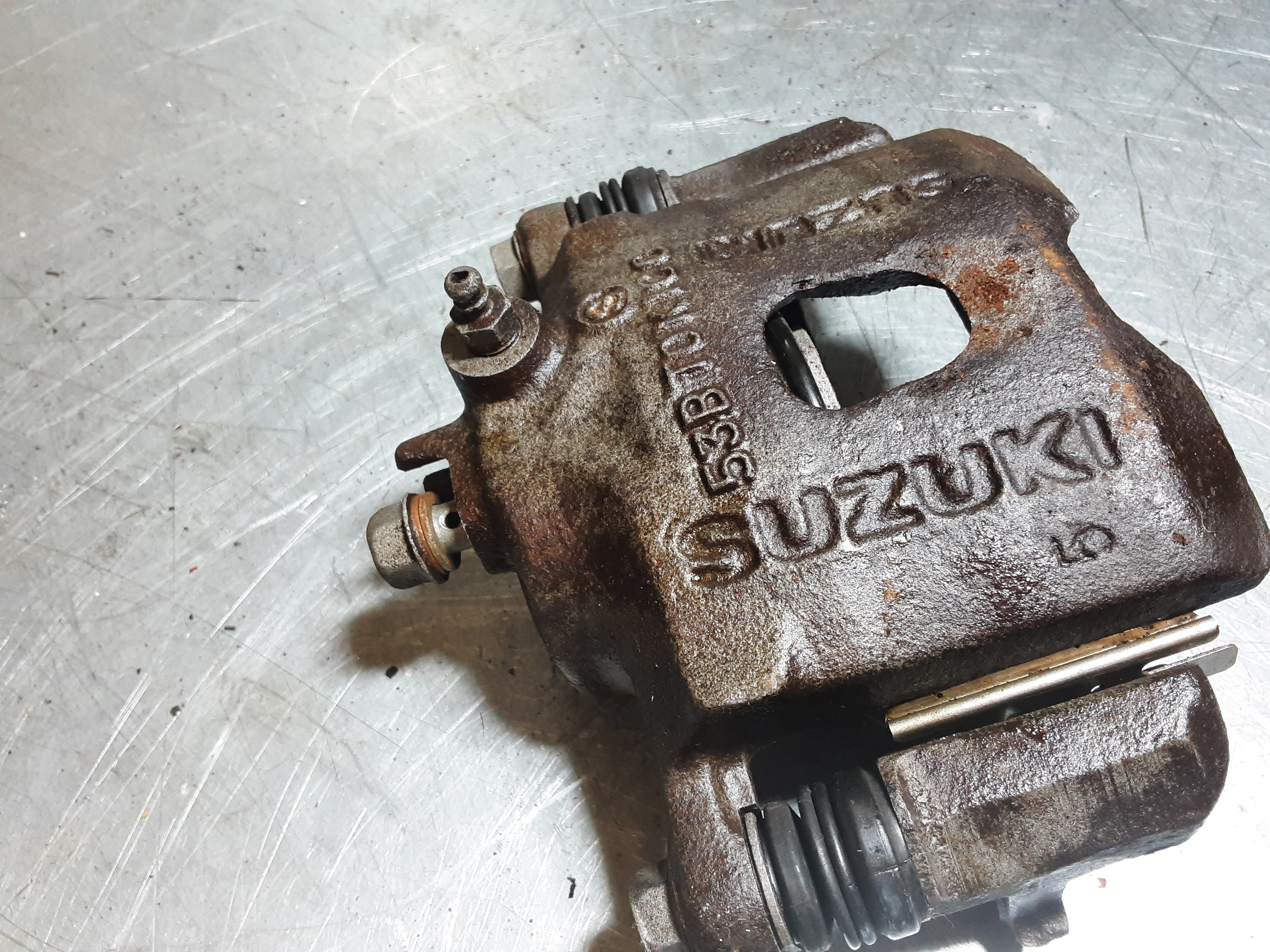 Remklauw Suzuki 53B TOKICO, 3LL15, HL.