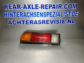 Achterlicht links Opel Manta B met zwarte rand, merk Hella.